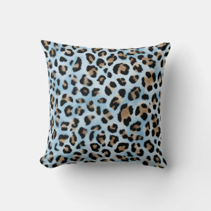 Tryckning av tan och blå leopard kudde