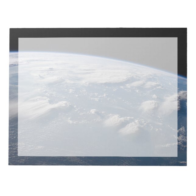 Tunt i jordens ängar vid södra Borneo. Anteckningsblock (Framsida)