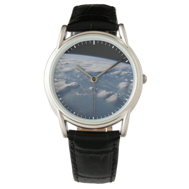 Tunt i jordens ängar vid södra Borneo. Armbandsur (Framsida)