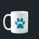"Turcoise Paw Print" Mugg<br><div class="desc">Vi presenterar Mugg, "Turcouise Paw Print" - ett charmerande och snyggt sätt att fira kärlek för hårigets vänner! Detta skarpa vita keramiska mugg är försett med ett vackert detaljerat hund av turkos, och skapar det som perfektens tillbehör för djurälskare. Den pulserande tassutskriften står mot den vita bakgrunden och tillför lite...</div>