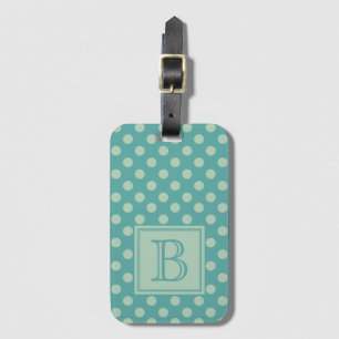 Turkos monogram prickmönster bagagebricka