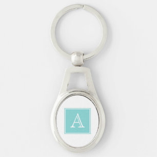 Turquise Square Monogram Metall Keychain Ovalt Silverfärgad Nyckelring