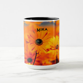Tusenskönemugg med orange blommor mugg