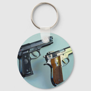Två .45 automatiska vapen för kaliber för nyckelring