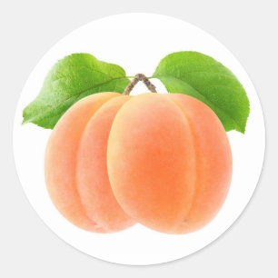 Två aprikoser runt klistermärke
