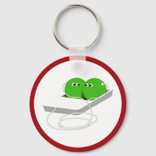 Två ärter i en Pod Nyckelring