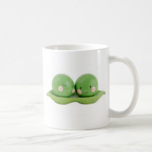 Två ärtor i en pod kaffemugg
