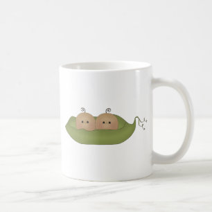 Två ärtor i en pod kaffemugg