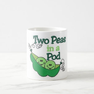 Två ärtor i en pod kaffemugg