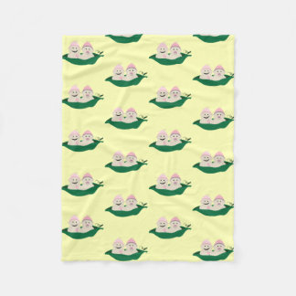 Två ärtor i en pod kopplar samman flickor fleecefilt