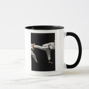 Två Blackbelts som munhuggas 2 Mugg