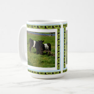 Två blåkalvar i bältet. kaffemugg