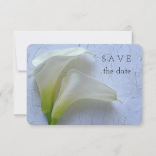 Två calla lilies på texturerad papper spara datumet