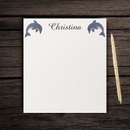 Två Cute Gnistra som delfiner som stöter Mörk blåt Anteckningsblock