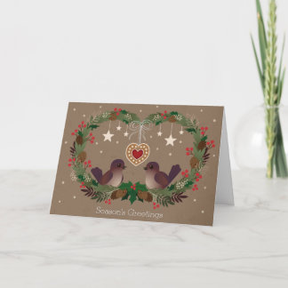 Två fåglar på en julkran helgkort
