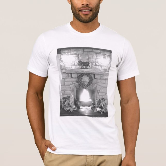Två flickor som sitter vid en spis på jul tee shirt (Framsida)