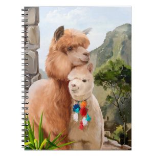 Två fluffy alpacas mot bakgrund av sjö anteckningsbok