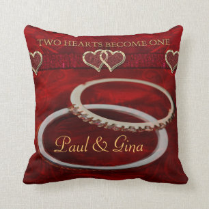 Två guldbröllopringar kudde