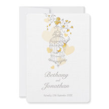 Två gulter öppen fågelburk bröllop