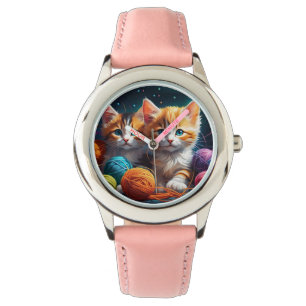 Två kattungar med bollar av garn armbandsur