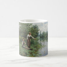 Två kvinnor som fiskar på Grass vid floden