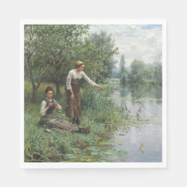 Två kvinnor som fiskar på Grass vid floden Pappersservett