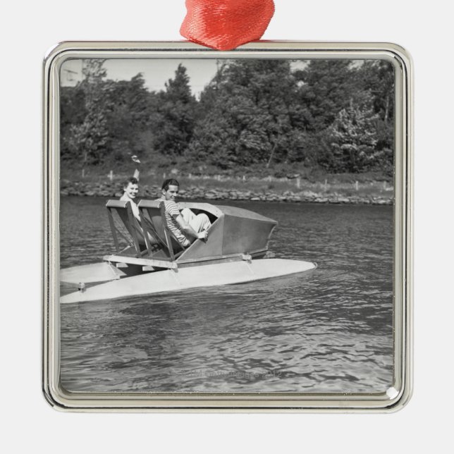 Två manar julgransprydnad metall (Framsidan)