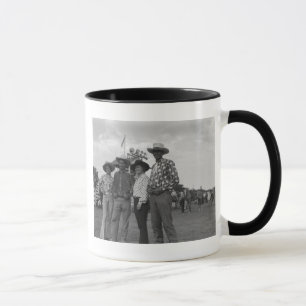 Två manar och två kvinnor på en rodeo mugg
