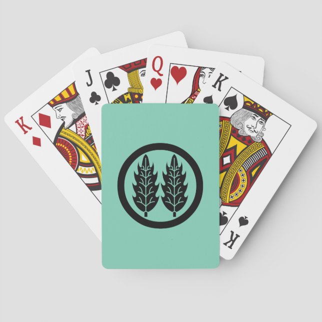 Två parallella järnekblad i cirkel spel kort (Baksidan)