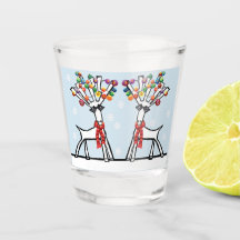 Två party-renar vid jul med snöflingor