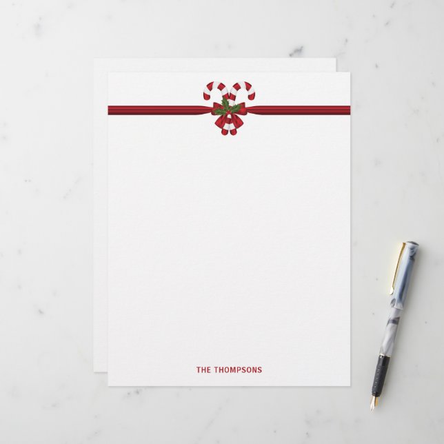 Två röda och vita Polkagrisar med text Brevhuvud (Fram/Back In Situ)