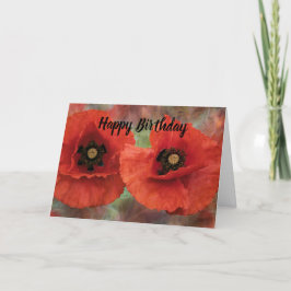 Två röda påsar på ett texturerat bakgrundsfoto helgkort