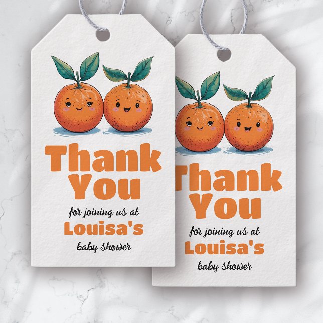 Två små handdukar med två babyskor Tack Presentetikett (Skapare uppladdad)