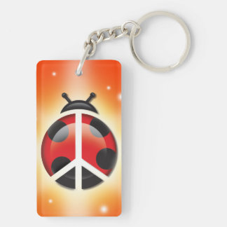 Tvåsidig keychain för nyckelpigafred