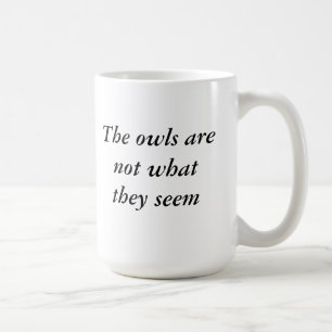 Tvilling- nå en höjdpunkt ugglor är inte vad de kaffemugg