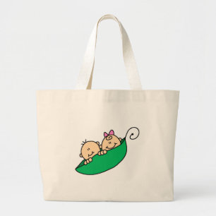 Tvilling- pojke och flicka i ärtapod jumbo tygkasse