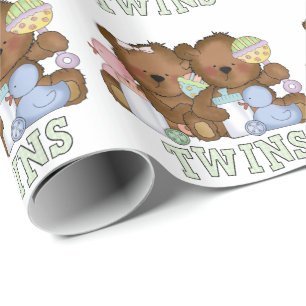 Tvillingpojke, flicka baby björnar som omsluter pa presentpapper