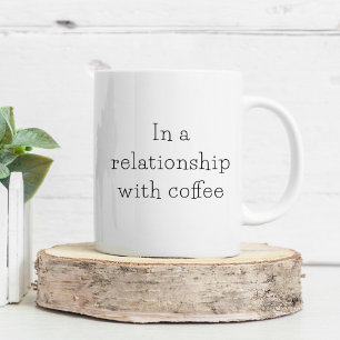 Typografi i en relation med kaffe kaffemugg