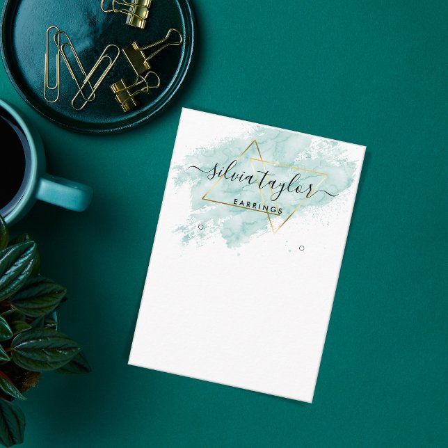 Typografi örringar visning som innehar smyckebuss visitkort (Skapare uppladdad)