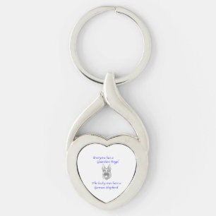TYSK HERDE FÖR SKYDDSÄNGEL TWISTED HEART SILVERFÄRGAD NYCKELRING