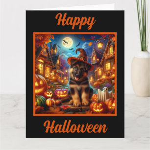 Tysk shepherd Puppy i en Halloween-by Kort