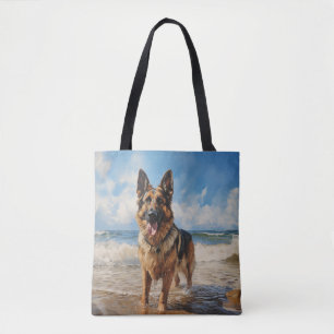Tyska Shepherd-hund på stranden Tygkasse