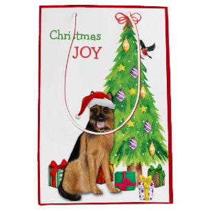 Tyska shepherd Hund Santa Hat och Julgran