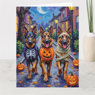 Tyska vallhundar eller schäferhundar trick-or-trea kort