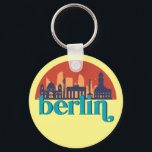 Tyskland City Skyline Retro Cityscape Art Nyckelring<br><div class="desc">Vintage- och reflexritorier med vackra skyliner, attraktion och cityscape-konst. Coola skyscraper och byggnad silhuette illustrerar handelsvara för turister och resenärer. Perfekt som souvenir att ta med sig hem när man reser värld runt. Spara minnet av din resa och semester med familj och vänner. Bakgrunden till färg kan anpassas till färg....</div>