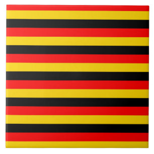tysks flagga ränder landsymbol röd gul bla kakelplatta