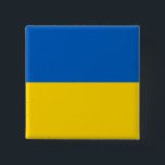 Ukraina Flagga Knapp<br><div class="desc">Det ukrainska flagga är en vågrät bicolor. Den använda färgen i flagga är blå,  gult. Andelen ukrainska flagga är 2:3. Ukrainas Flagga antogs 1992. Den första användan i den nuvarande flagga var 1848. Den senaste ändringen av den nuvarande utformningen av den ukrainska flagga gjordes 1918.</div>