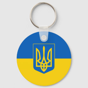 Ukrainas flagga med jackande av arm nyckelring