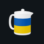 Ukrainas Flagga Tekanna<br><div class="desc">Lägg till lite ukrainskt pride i din teinsamling med vår exklusiv tekanna som innehåller Ukrainas flagga! Denna tekanna, som utformats med stor noggrannhet, är inte bara en funktionell fråga, utan en firande av det ukrainska arvet och det ukrainska pridet. Den sjudande designen visningar på ett framträdande sätt det ikoniska ukrainska...</div>