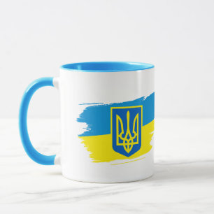 Ukrainas jacka i statlig flagga vid arm mugg